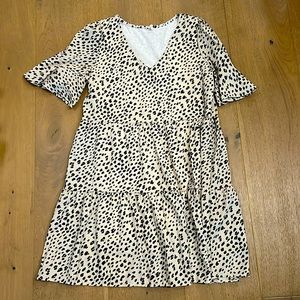 Cream and black ruffled maternity dress